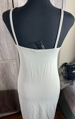 Vestido midi JAMES PERSE NUEVO CON ETIQUETAS Talla 1 gris funda bodycom precio de venta sugerido por el fabricante $395 elástico - Imagen 7 de 12
