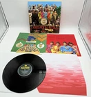 The Beatles Sgt. Pepper’s Vinyl LP 2012 Stereo Remaster With Inserts VG+