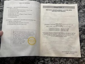 Consola de sistema Nintendo NES Control Deck REV-2 libro de instrucciones y clip de peri&oacute;dico