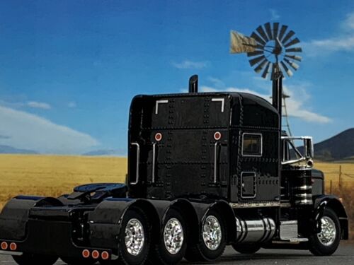 1/64 DCP BLACK PETERBILT 379 TRI AXLE W/ 70" MID ROOF SLEEPER - Picture 2 of 6