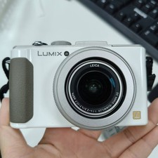 Panasonic LUMIX DMC-LX7 10.1MP 3.8x Optical Zoom White Digital Camera English