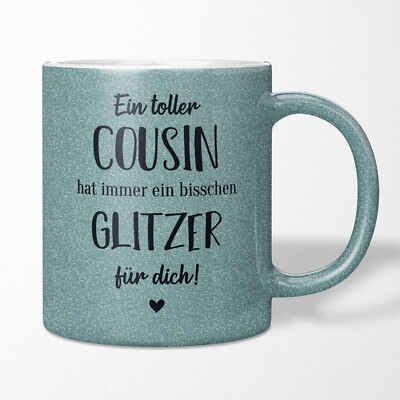JUNIWORDS Glitzer Tasse  ''Ein toller Cousin hat immer ein bisschen Glitzer...''