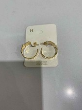 Gold Star Pierced Hoop Earrings