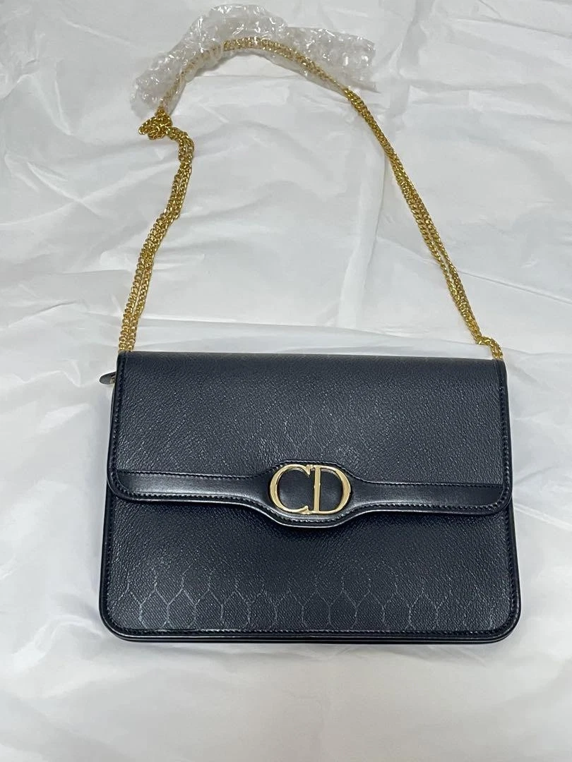 Sac pochette Christian Dior en cuir noir