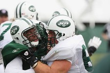 Guard Alan Faneca New York Jets blocks linebacker Vernon Gholston - 2009 Photo