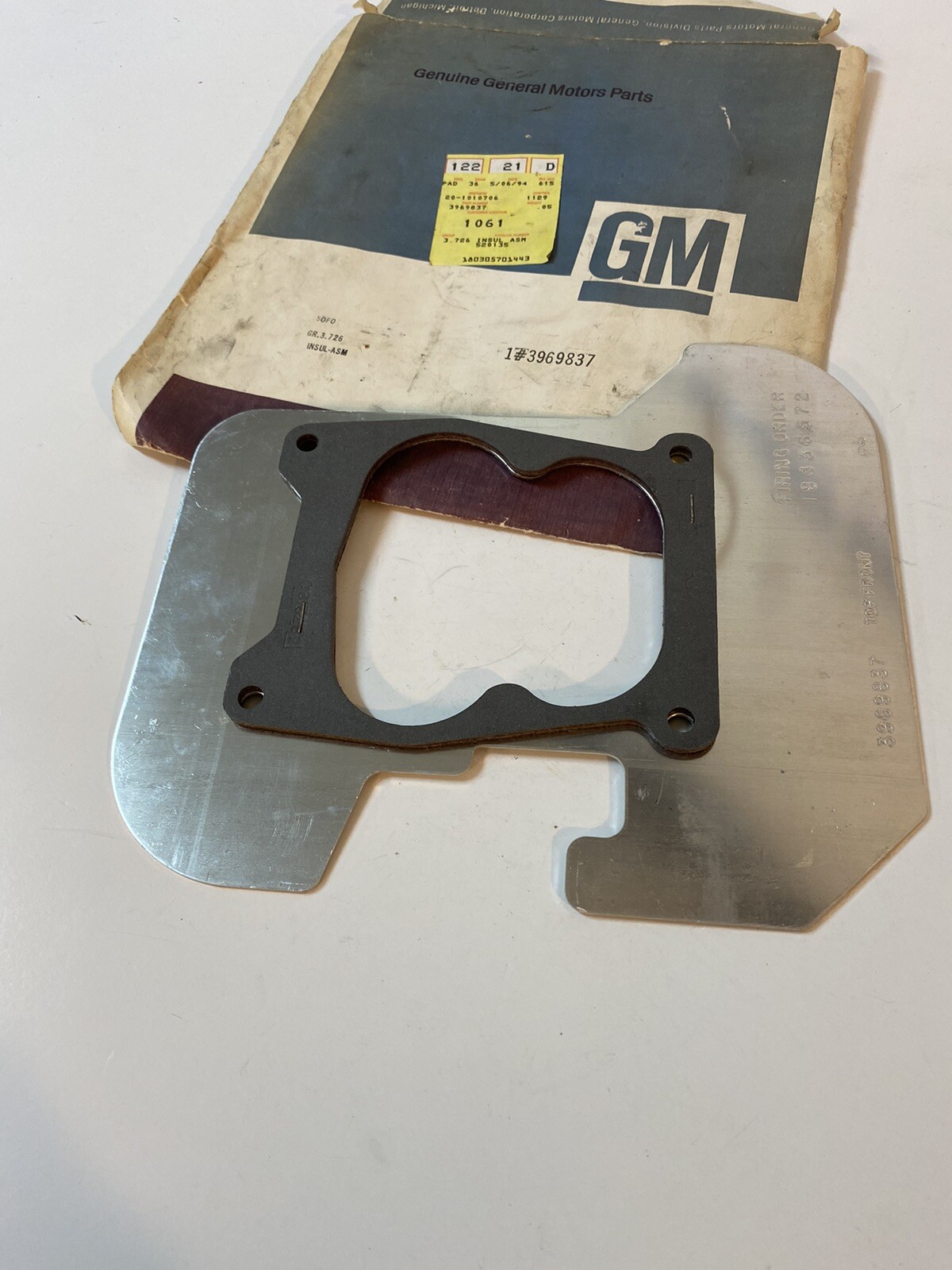 Original GM NOS Quadrajet 4 BBL Carburetor Heat Shield Insulator