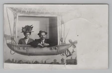 Postcard RPPC Man Woman Big Hat Couple Studio Portrait Boat View AZO 1900s