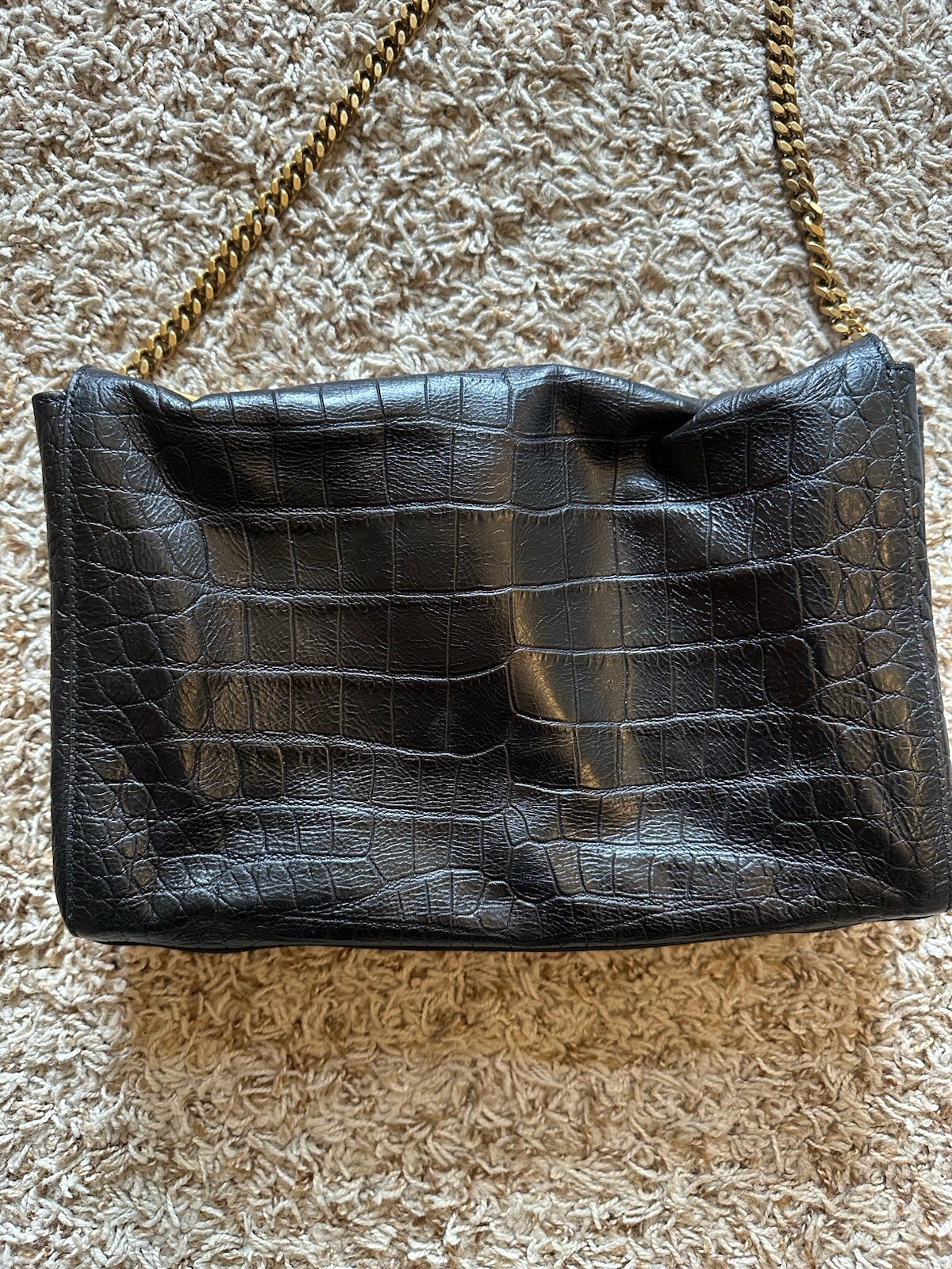 Borsa a tracolla Saint Laurent reversibile Kate con interno in pelle di pitone.