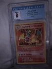 Charizard 11/108 Evolutions Holo CGC 8 (2016 English Pokémon TCG)