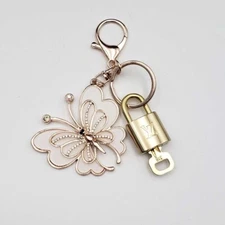 100% Auth Louis Vuitton Lock & Key with unbranded Bagcharm, Keycharm, Keychain