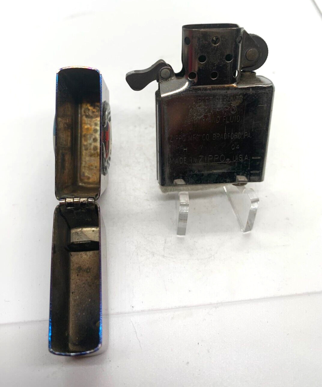 Zippo Lighter. 2 sided. Cadillac & BMW. Polished Blue color. USA 2004. Lot Y677
