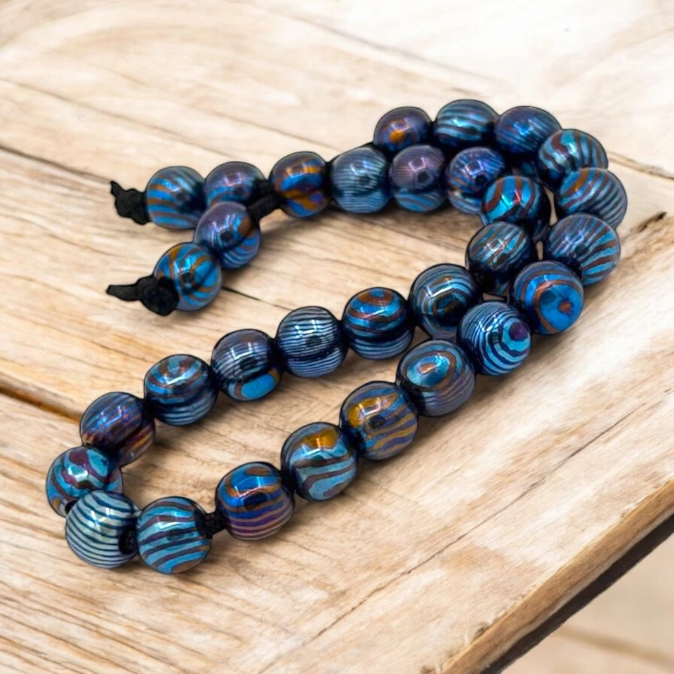 Pulsera hecha a mano con cuentas Timasco forjada a mano joyería Timasco titanio Damasco Foto 3 de 4