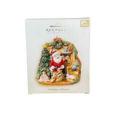 2006 Hallmark ornament club a glimpse of Santa magic light up ornament