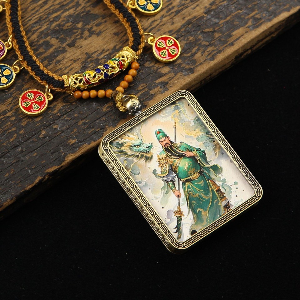 A GuanGong Thangka-style pendant necklace blending Chinese religious iconography with vintage jewelry craftsmanship — genuinely unusual and visually striking.