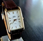 VINTAGE TIMEX INDIGLO RECTANGULAR DIAL QUARTZ MEN'S GOLDEN LEATHER DRESS WATCH