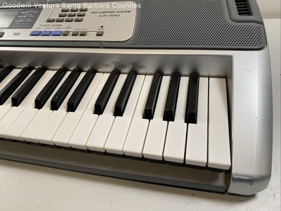 Casio Key Lighting System LK-100 61-Key Electronic Keyboard - Read