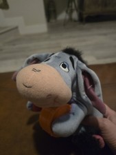 Disney Plush Eeyore. Plays the drums plays 3 songs  has 3 sayings Music Toy 