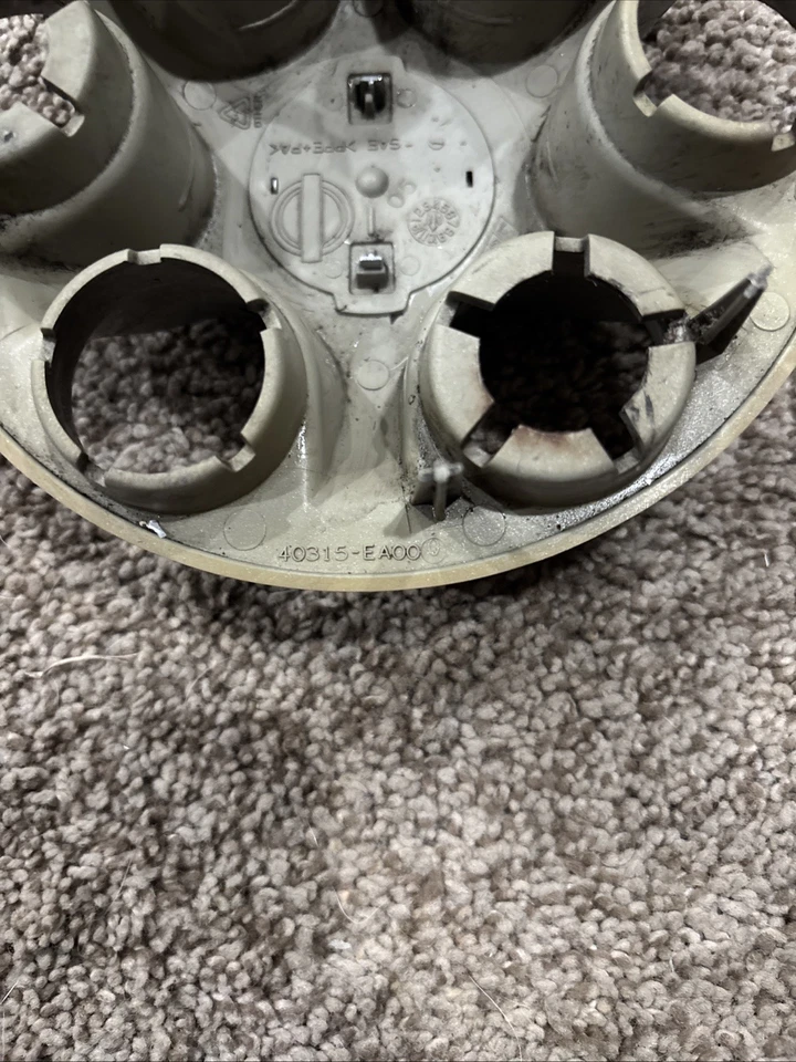 Genuíno Nissan 2005-2017 Nissan Frontier - Tampa de roda 40315-EA00A - Imagem 3 de 4