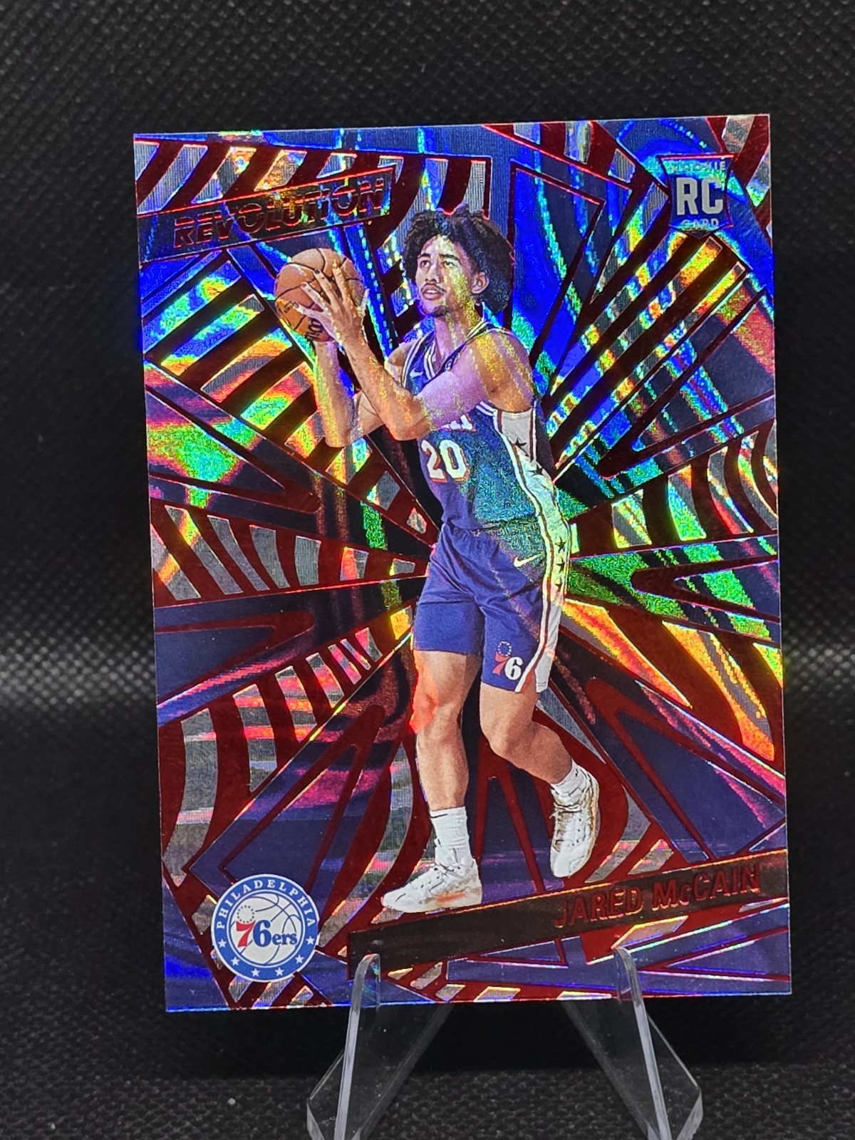 2024-25 Panini Revolution Rookies Jared McCain #124 Red Swirl RC