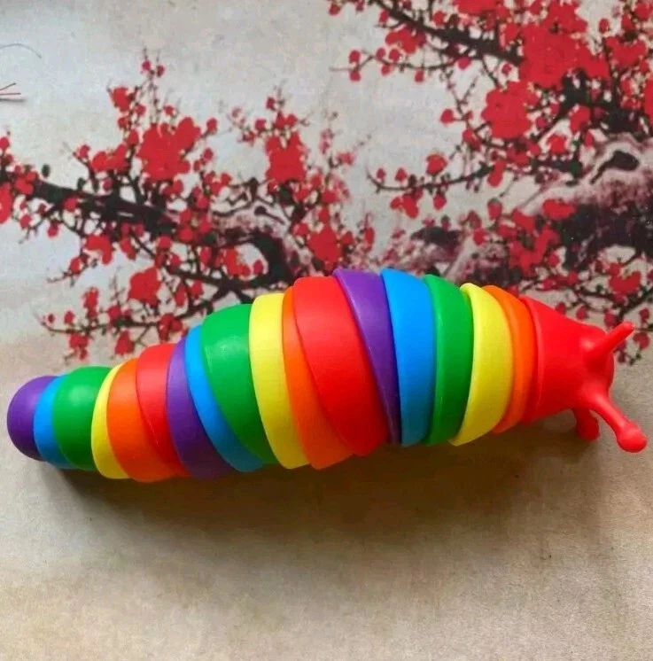 Caja de 4 Juguetes Arco Iris Fidget Slug Anti Estrés Sensorial Ansiedad Alivio Niños 7.5" Foto 3 de 4