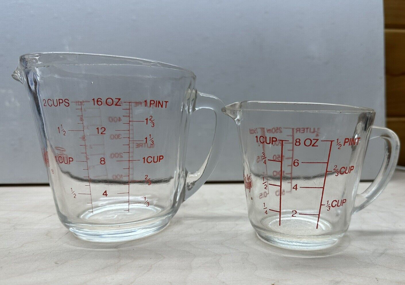 VTG Lot of 2 Fire King Measuring cups, red 1 cup (496), 2 cup (967