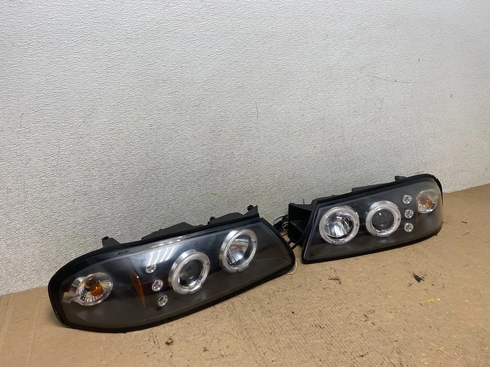 Juego faros halógenos izquierda+derecha Chevrolet Impala 2000-2005 Q2875 DG Foto 3 de 4