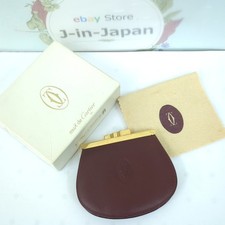 Portafoglio Cartier Must de Cartier portamonete bordeaux tono oro con scatola