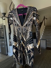 Gorgeous Express BLACK AND GOLD sequin mini dress. SizeXS New With Tag
