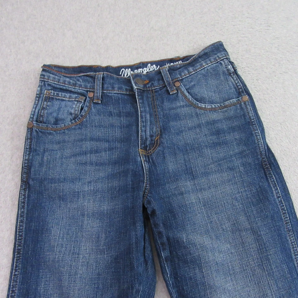 Jeans retro Wrangler para hombre 30 x 30 corte bota relajado lavado medio Foto 3 de 4