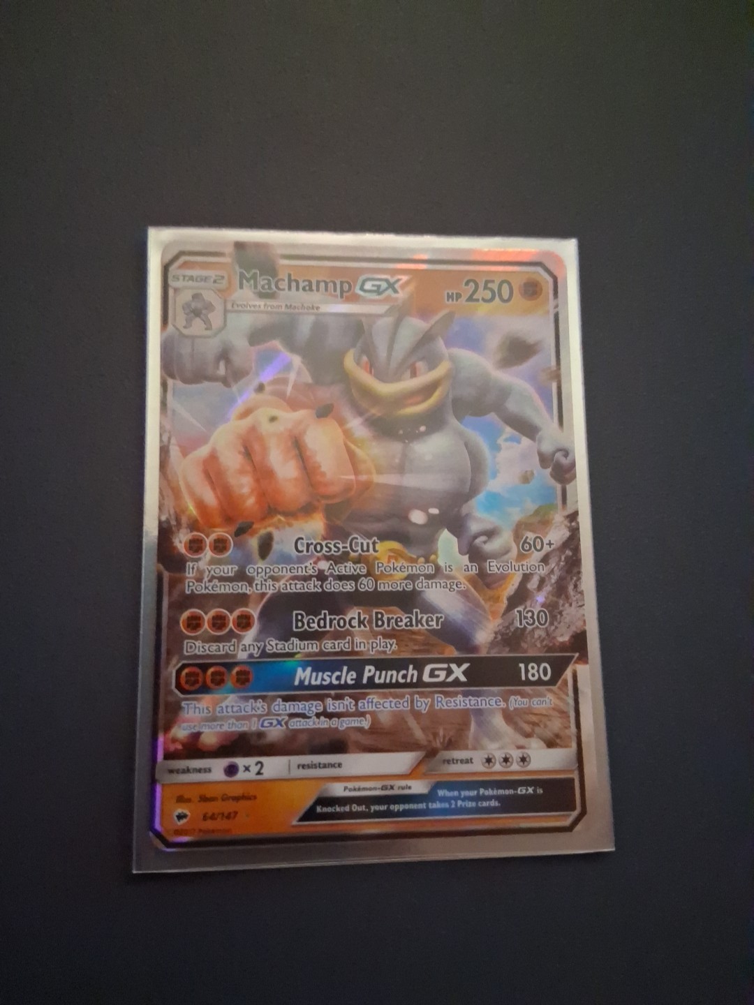 Machamp GX 64/147 Sm-Burning Shadows Holo error off cut