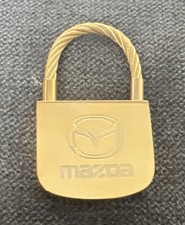Mazda Padlock Style Engraved Gold Tone Keychain Design Winged Mazda Logo Mazda Padlock Style Engraved Gold Tone Keychain Design Winged Mazda Logo