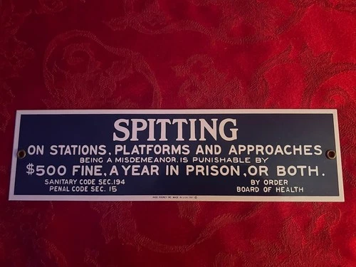 Ande Rooney Vintage Spitting Porcelain Sign