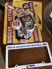 Pepsi Lot with 3 tin Pepsi signs, Devil Rays license frame and more