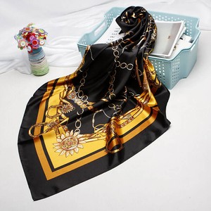 black and gold head scarf