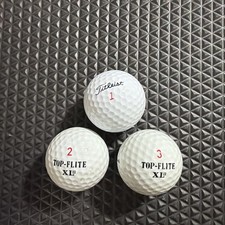 3 of Golfs Balls - 2 Top-Flite XLII 1 Titleist