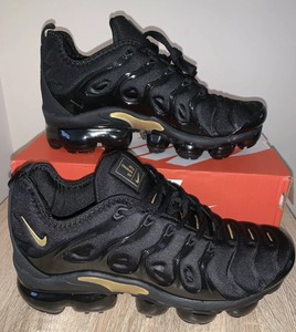 black vapormax with gold tick