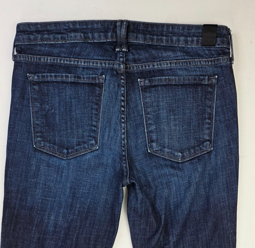 Back view of Vince Dylan skinny women’s 28X31 blue denim jeans with two pockets and belt loops made in the USA.