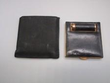 Poudrier de sac ancien en métal doré et imitation peau de serpent