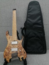 Guitarra Ibanez QX527PB de 7 cuerdas sin cabeza álamo tapa de arce tostado probada