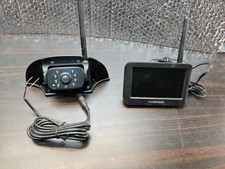 Furrion S wireless RV Travel Trailer 4" Monitor backup camera system.