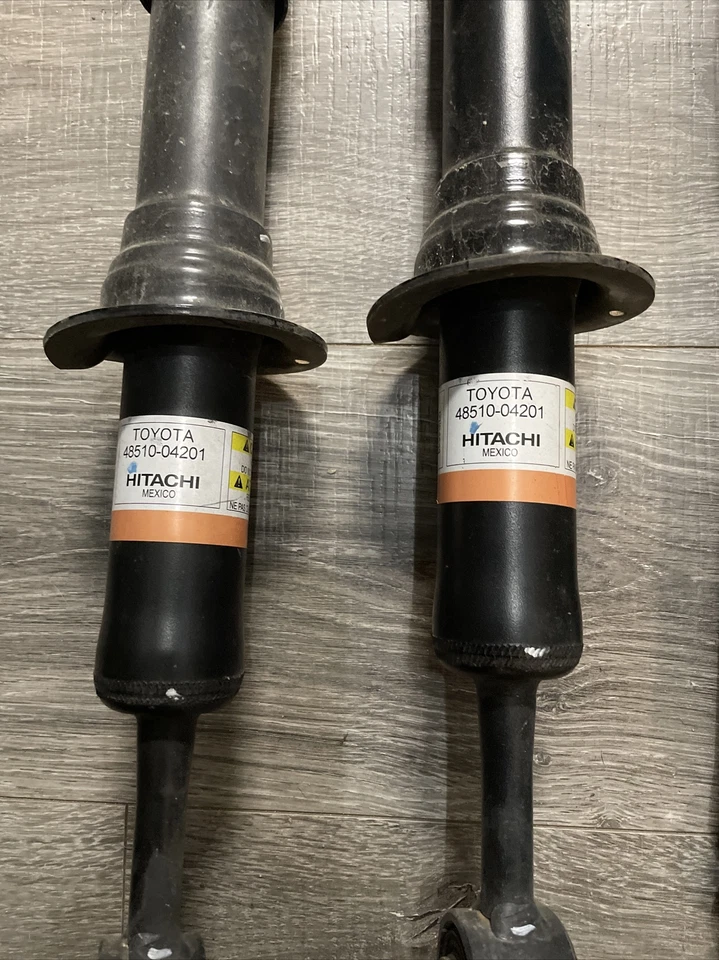 Toyota Tacoma 2016-23 4x4 Hitachi de fábrica amortiguadores delanteros y traseros 10 k millas Foto 2 de 4