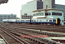 PHOTO  NETWORK SOUTHEAST TRAIN AT THE APPROACH TO WATERLOO STATION THE TRAIN MIG