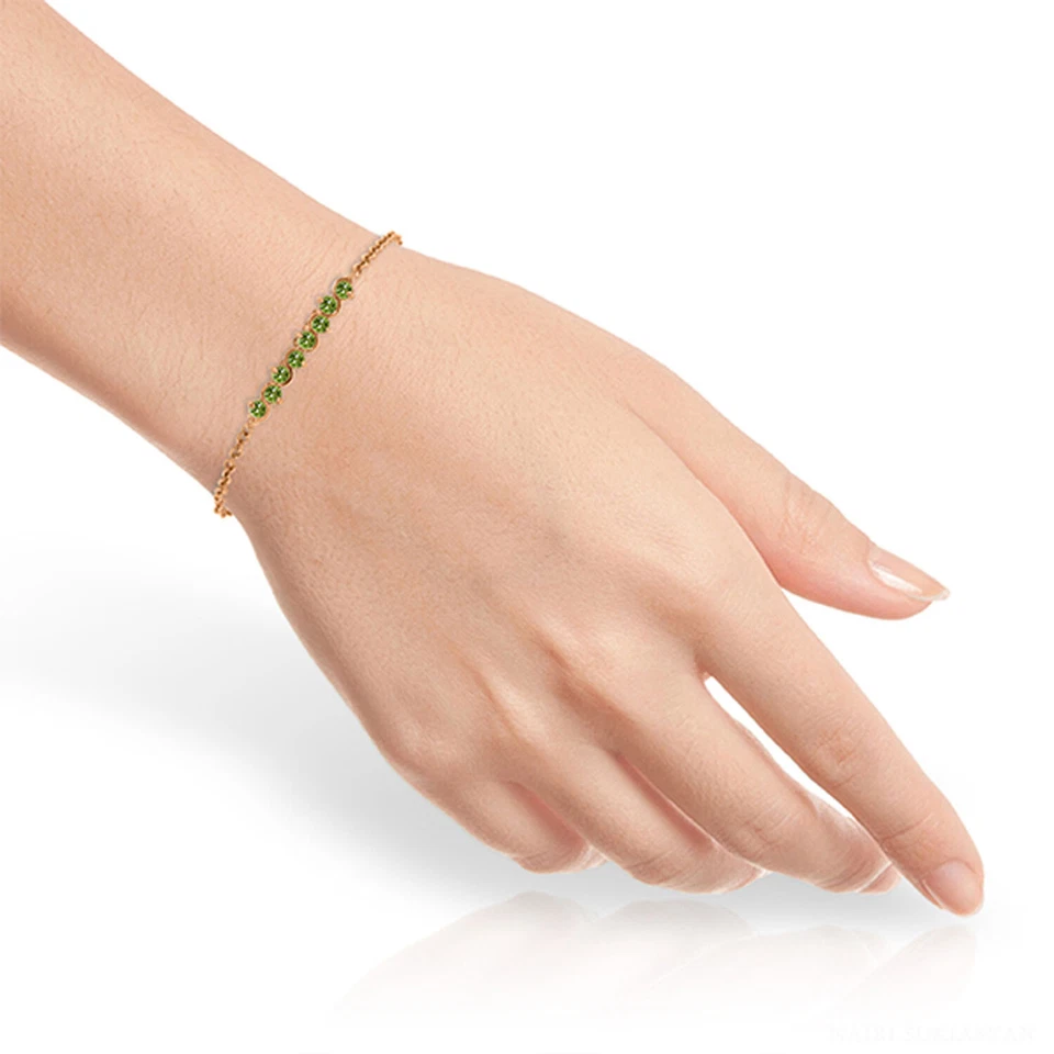 14K. SOLID GOLD BRACELET WITH NATURAL PERIDOTS - Image 3 of 4