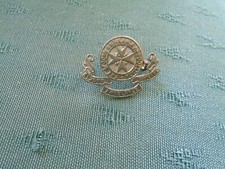 VINTAGE ST JOHN AMBULANCE ASSOCIATION - METAL UNIFORM CAP BADGE 
