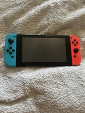 Nintendo Switch 32GB Console & official Neon Blue And Red Joy Con’s, Fully Work