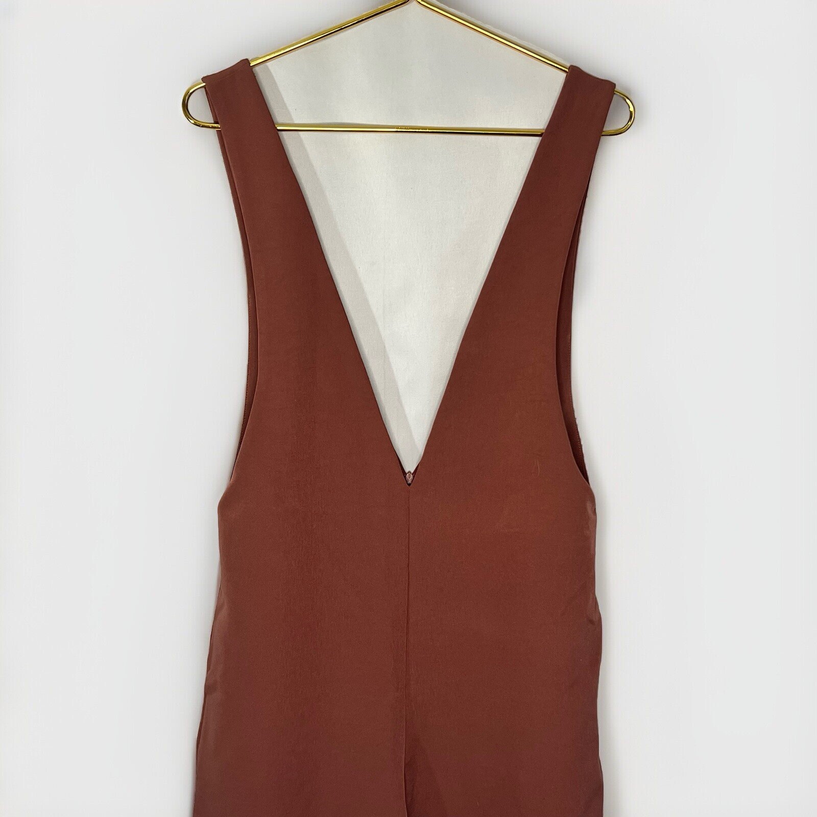 FILA tutto: tuta crop row rustica arancione malva profondo scollo a V senza maniche gamba larga Med