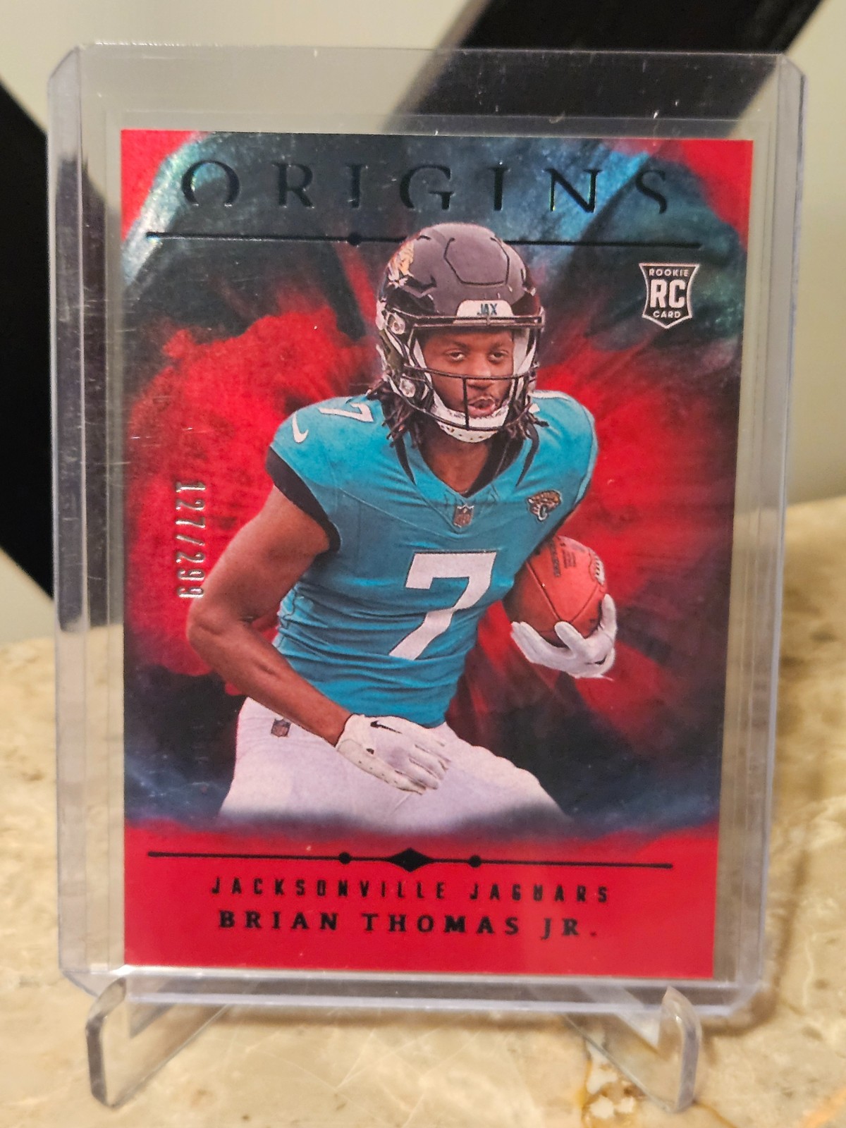 2024 Panini Origins #119 Brian Thomas Jr. Holo Red #/299 Rookie Card RC Jaguars