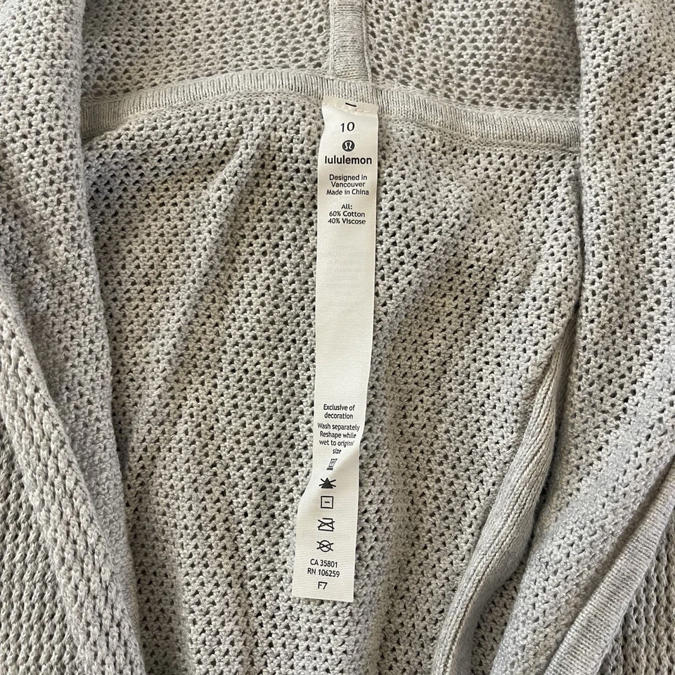 Sudadera con Capucha Lululemon Para Mujer 10 Movimiento Todavía Envoltura Espalda Dividida Gris Nimbus Suéter Foto 4 de 4