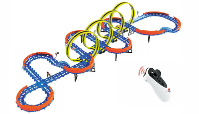 Amewi 100674 RC Magic Traxx Glow 113-teilig 2 Rennfahrzeugen Rennbahn Looping