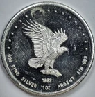 1982  1 oz .999  Silver Monex Internationalr Eagle Round in a Capsule